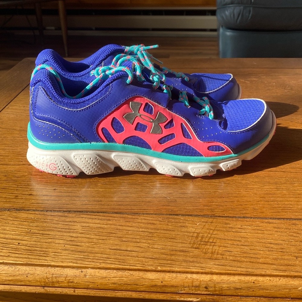 Under Armour Blue and Pink athletic shoes with microg .  Like new condition.